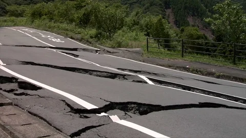 Earthquake damaged road Stock Footage 74024682