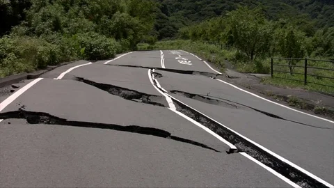 Earthquake damaged road Stock Footage 74024692