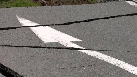 Earthquake damaged road Stock Footage 74024709