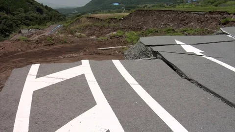 Earthquake damaged road Stock Footage 74024723