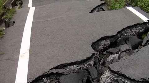 Earthquake damaged road Stock Footage 74024798