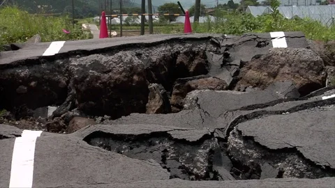 Earthquake damaged road Stock Footage 74024871