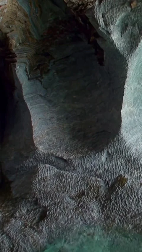 Into the earth's embrace exploring a mysterious cavern Stock Footage 320009694