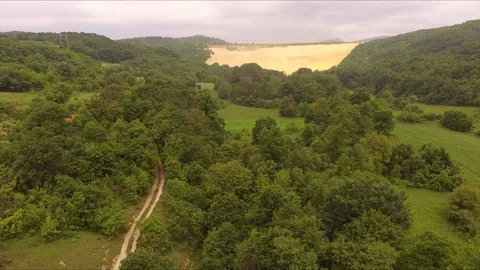 Earth's path through the forest in summer time 스톡 동영상 112793217