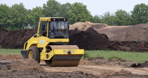 Earthwork roller in action at construction site in the Netherlands, 4K Stock Footage 109552118
