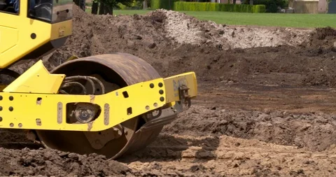 Earthwork roller in action at construction site in the Netherlands, 4K Stock Footage 109552786