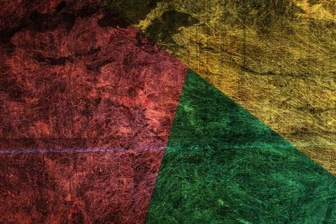 Earthy-toned geometric abstract with triangular sections in red, green, and gold Stock Photos