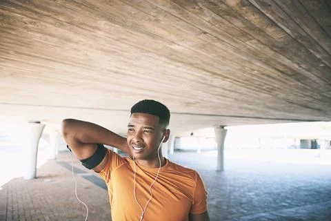 Ease the pace, ease the pain. a young man experiencing neck pain while working Stock Photos