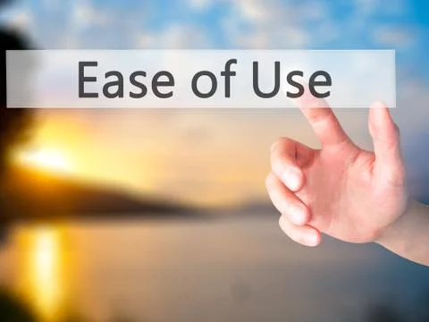 Ease of Use - Hand pressing a button on blurred background concept on visual  写真素材