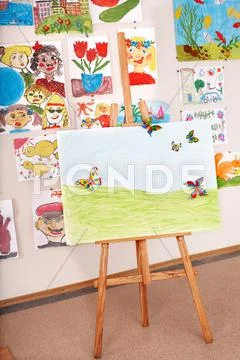 Easel in art class. Stock Photos