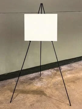 Easel-with-blank-poster Stock Photos