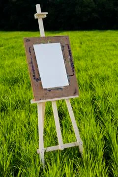 Easel with a blank sheet Photos