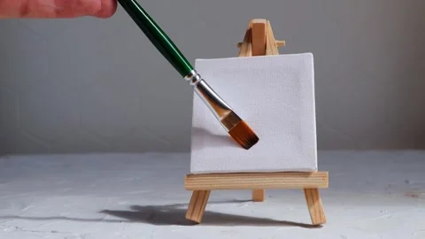 An easel for drawing on a gray background with copy space. drawing concept Stock Footage 242773625