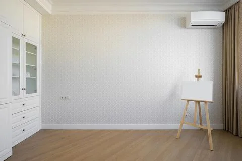 Easel in the interior of an empty room 写真素材