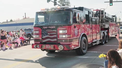 East Pierce red fire engine truck driving in the Sumner WA street  sammer egg 38 Stock Footage 339531050