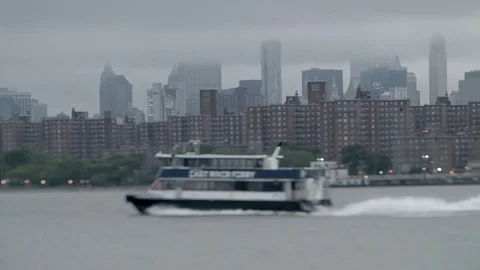 East River Ferry going fast. Strong Wake. Manhattan in the Background. New York. Video stock 75328105