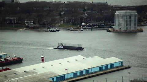 East River Tug Boat Sails Up Stock Footage