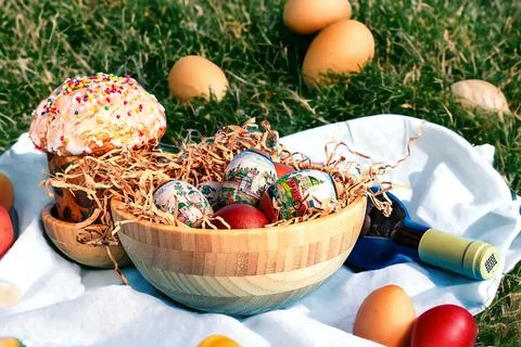 Easter and eggs background. Background. Easter cake with eggs and wine. Stock Photos