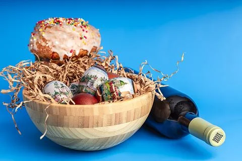 Easter and eggs background. Background. Easter cake with eggs and wine. Stock Photos
