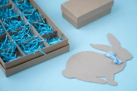Easter background blank box for Easter eggs, Easter Bunny and gift box. Easte Stock Photos