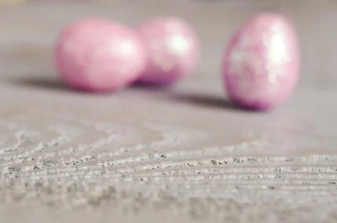 Easter background with blurred eggs Stock Photos