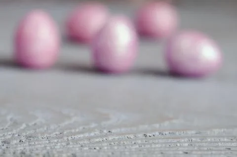 Easter background with blurred eggs Stock Photos