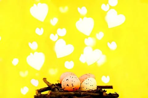 Easter background with bright bokeh with Easter egg decor Stock Photos