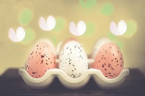Easter background with bright bokeh with Easter egg decor Stock Photos