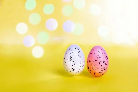 Easter background with bright bokeh with Easter egg decor Stock Photos