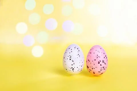 Easter background with bright bokeh with Easter egg decor Stock Photos