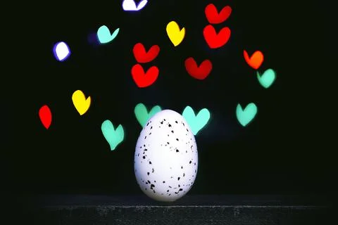 Easter background with bright bokeh with Easter egg decor Stock Photos