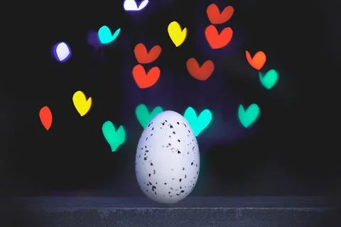Easter background with bright bokeh with Easter egg decor Stock Photos