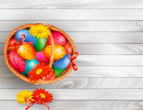 Easter background with color easter eggs in basket on wooden table . vector Stock Illustration