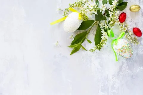 Easter background. Colorful Easter background with colored eggs and sweets. Stock Photos