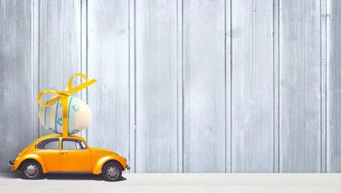 Easter background with colorful easter eggs on wooden background. Stock Photos