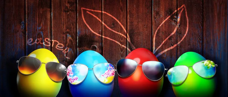 Easter background with colorful easter eggs on wooden background. Stock Photos