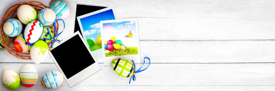 Easter background with colorful easter eggs on wooden background. Stock Photos