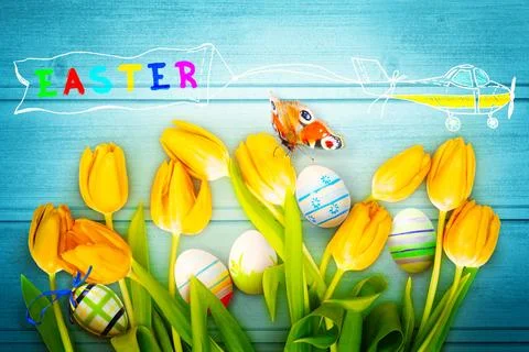 Easter background with colorful easter eggs on wooden background. Stock Photos