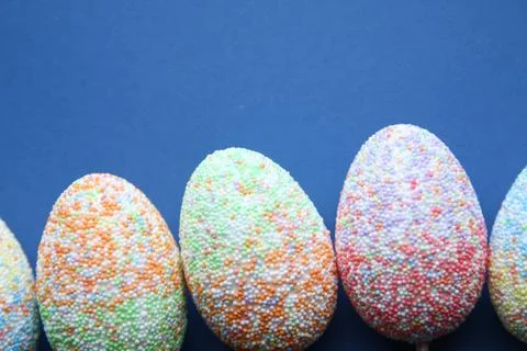Easter background. Colorful Easter Eggs on Blue Background Stock Photos