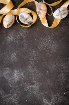 Easter background with decorative easter eggs and ribbon. Stock-Fotos