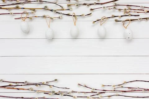 Easter background with decorative Easter eggs and willow tree branch. Copy space Foto stock