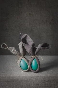 Easter background with Easter bunny made from eggs and linen napkin. Festiv.. Stock Photos