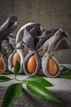 Easter background with Easter bunny made from eggs and linen napkin. Festiv.. Stock Photos