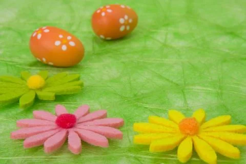 Easter background. easter eggs and flowers. Stock Photos