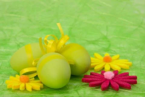 Easter background. easter eggs and flowers. Stock Photos