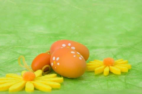Easter background. easter eggs and flowers. Stock Photos