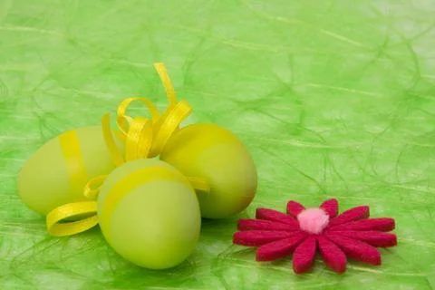 Easter background. easter eggs and flowers. Stock Photos