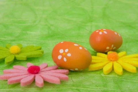 Easter background. easter eggs and flowers. Stock Photos