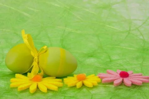 Easter background. easter eggs and flowers. Stock Photos