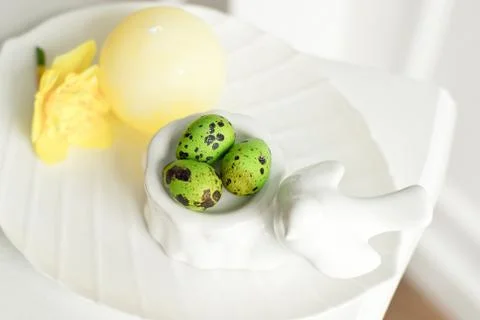 Easter background with Easter eggs and spring flowers. Stock Photos